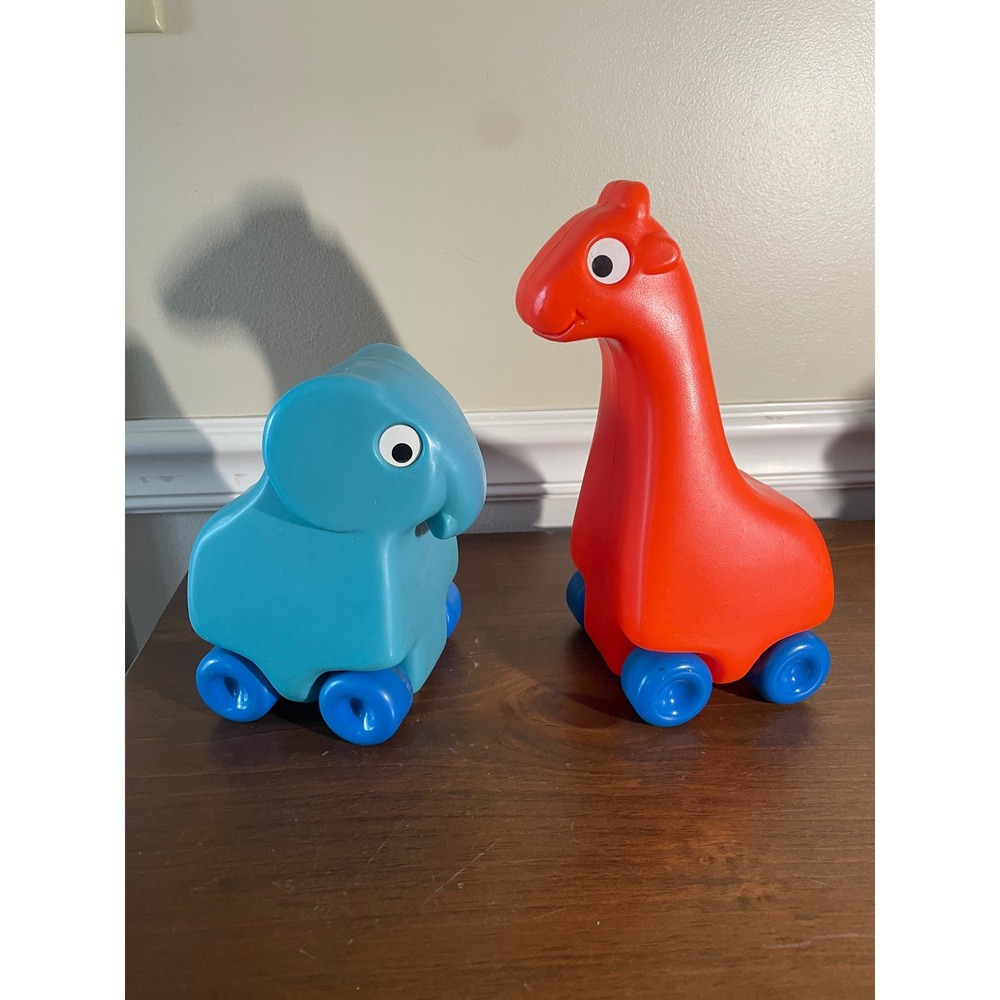 Vintage little tykes Plastic Rolling Animal Toys Elephant Giraffe Set of 2